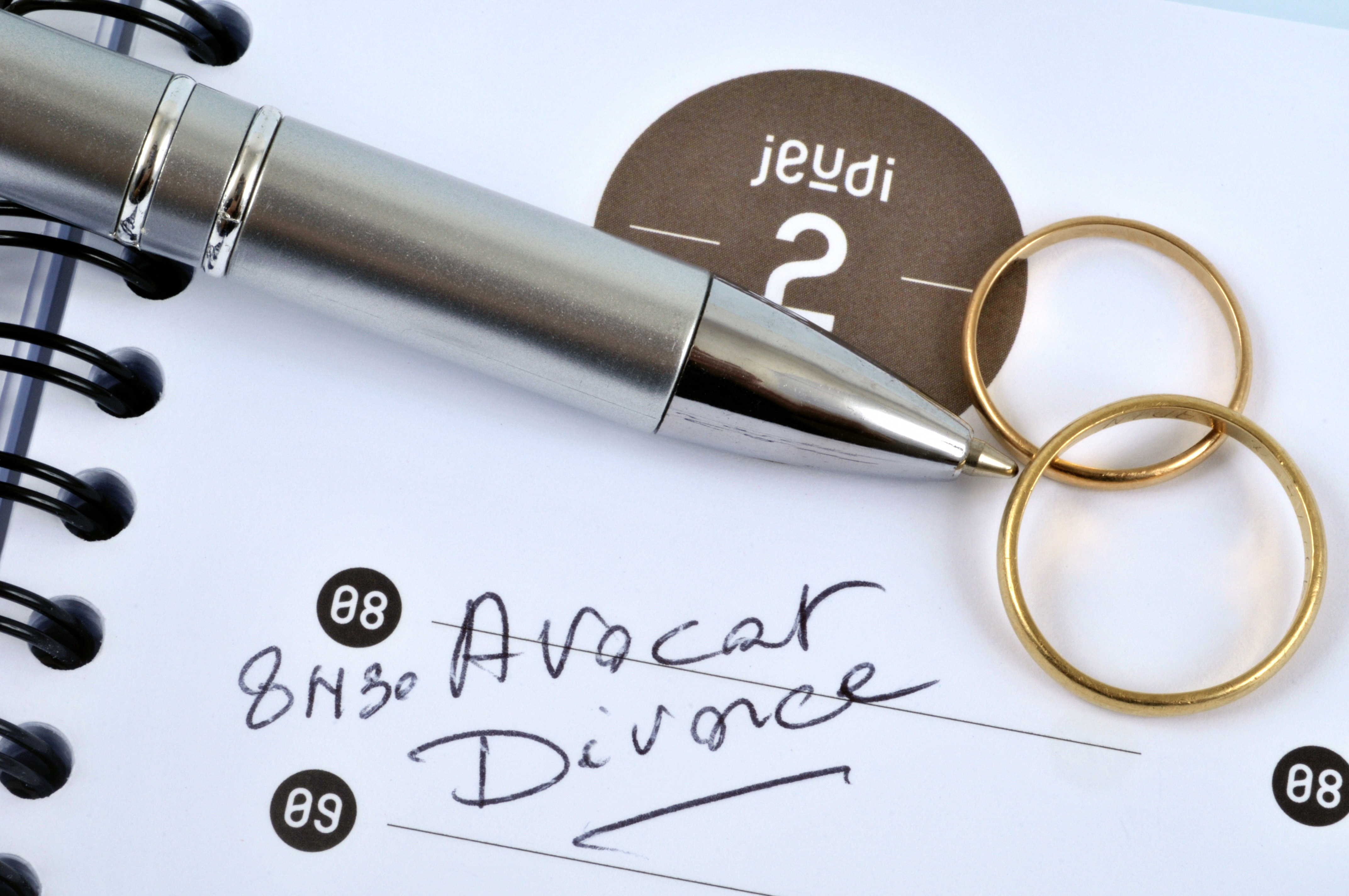 illustration agenda rendez vous pour Divorce avec crayon et alliances